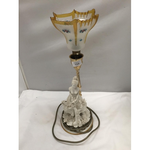 154 - A TABLE LAMP WITH CERAMIC LADY BASE AND GLASS SHADE HEIGHT 44CM