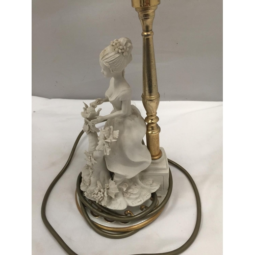 154 - A TABLE LAMP WITH CERAMIC LADY BASE AND GLASS SHADE HEIGHT 44CM