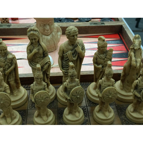 163 - A WOODEN CHESS BOARD WITH RESIN ROMAN FIGURE CHESS PIECES - 3 A/F PLUS A BACKGAMMON/DRAUGTS BOARD WI... 