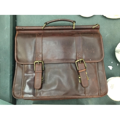 222 - A BROWN WILSON'S LEATHER BRIEF CASE WITH HANDLE