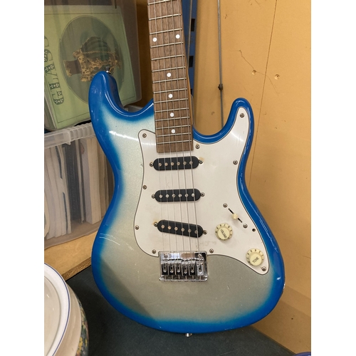 289 - A GROOVE TURQUOISE AND WHITE ELECTRIC GUITAR