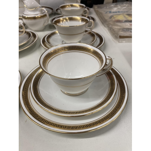 365 - A DIAMOND CHINA WHITE AND GILT PART TEASET TO INCLUDE CUPS, SAUCERS, PLATES, CREAM JUG, BOWL, ETC