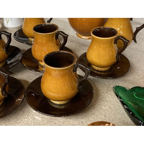 828 - A BOULTON STONEWARE CARAMEL COLOURED COFFEE SET TO INCLUDE A COFFEE POT, CREAM JUG, SIX CUPS AND SAU... 