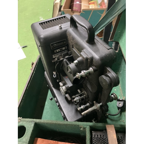 838A - A VINTAGE DITMAR FILM PROJECTOR IN A CASE WITH INSTRUCTIONS AND ANCILLARIES