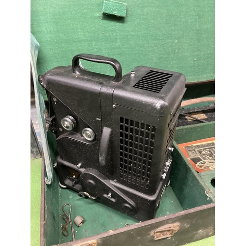 838A - A VINTAGE DITMAR FILM PROJECTOR IN A CASE WITH INSTRUCTIONS AND ANCILLARIES