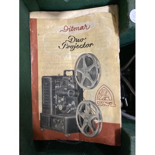 838A - A VINTAGE DITMAR FILM PROJECTOR IN A CASE WITH INSTRUCTIONS AND ANCILLARIES