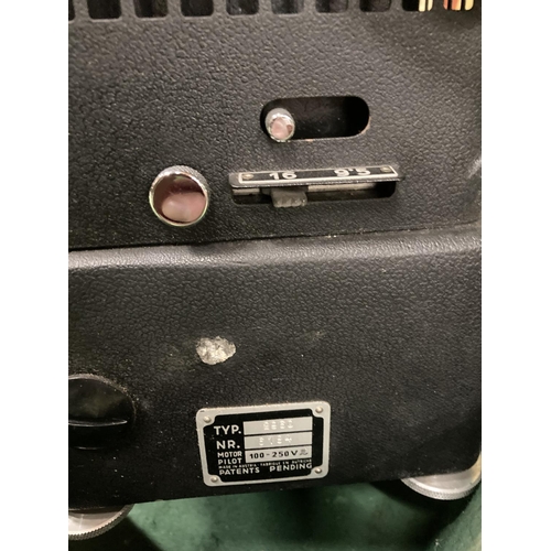 838A - A VINTAGE DITMAR FILM PROJECTOR IN A CASE WITH INSTRUCTIONS AND ANCILLARIES