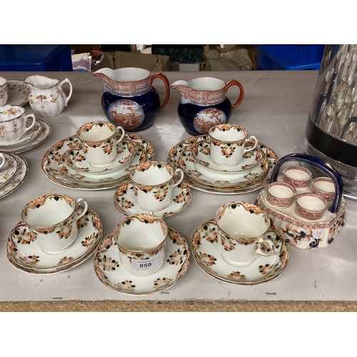 859 - A QUANTITY OF OSBOURNE CHINA TO INCLUDE CUPS, SAUCERS, SIDE PLATES, EGG CUPS IN A STAND PLUS TWO RID... 