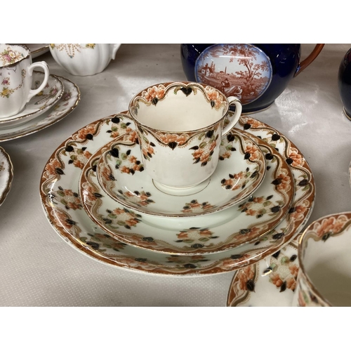 859 - A QUANTITY OF OSBOURNE CHINA TO INCLUDE CUPS, SAUCERS, SIDE PLATES, EGG CUPS IN A STAND PLUS TWO RID... 