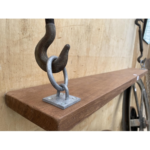 1212 - AN INDUSTRIAL TURNBUCKLE FLOATING MAHOGANY SHELF (L:114CM)