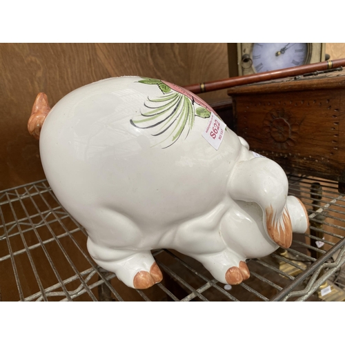 1233 - A LARGE CERAMIC PIG MONEY BOX WITH STOPPER