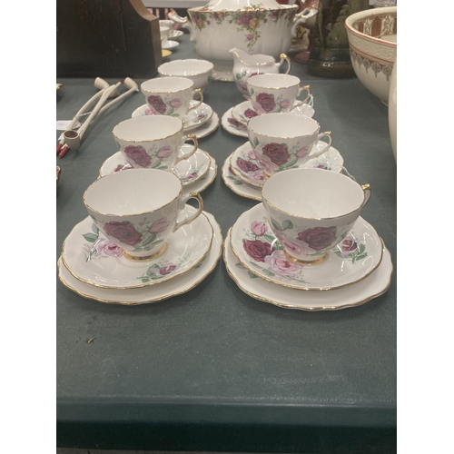 54 - A CROWN REGENT PART TEASET WITH ROSES DESIGN AND GILT AROUND THE RIMS AND HANDLES TO INCLUDE CREAM J... 