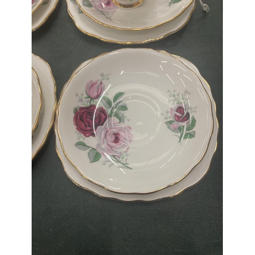 54 - A CROWN REGENT PART TEASET WITH ROSES DESIGN AND GILT AROUND THE RIMS AND HANDLES TO INCLUDE CREAM J... 