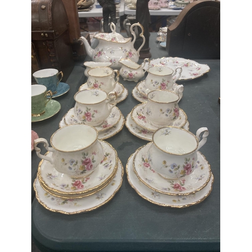 58 - A ROYAL ALBERT 'TENDERNESS' TEASET TO INCLUDE TEAPOT, CAKE PLATE, CREAM JUG, SUGAR BOWL, CUPS, SAUCE... 