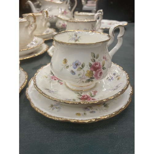 58 - A ROYAL ALBERT 'TENDERNESS' TEASET TO INCLUDE TEAPOT, CAKE PLATE, CREAM JUG, SUGAR BOWL, CUPS, SAUCE... 