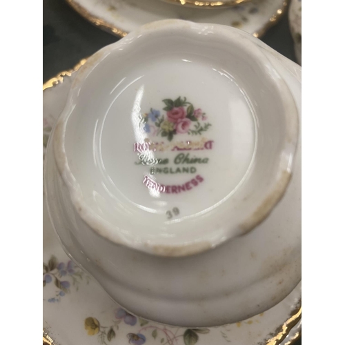 58 - A ROYAL ALBERT 'TENDERNESS' TEASET TO INCLUDE TEAPOT, CAKE PLATE, CREAM JUG, SUGAR BOWL, CUPS, SAUCE... 