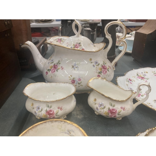 58 - A ROYAL ALBERT 'TENDERNESS' TEASET TO INCLUDE TEAPOT, CAKE PLATE, CREAM JUG, SUGAR BOWL, CUPS, SAUCE... 