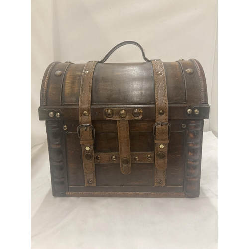 60 - A WOODEN DOMED CASE WITH LEATHER STRAPS 29CM WIDTH, HEIGHT 27CM DEPTH 20CM