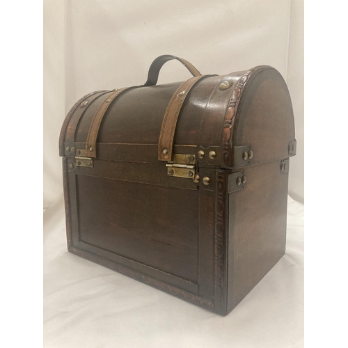 60 - A WOODEN DOMED CASE WITH LEATHER STRAPS 29CM WIDTH, HEIGHT 27CM DEPTH 20CM