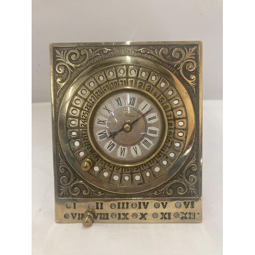 61 - A VINTAGE STYLE BRASS CLOCK WITH ROMAN NUMERALS 14.5CM X 12CM