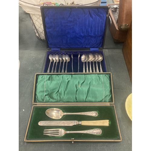 64 - TWO VINTAGE BOXES OF FLATWARE TO INCLUDE TEASPOONS, SUGAR TONGS AND A KNIFE, FORK AND SPOON SET