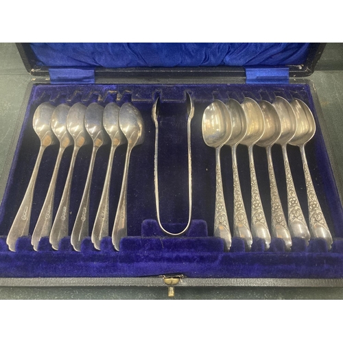 64 - TWO VINTAGE BOXES OF FLATWARE TO INCLUDE TEASPOONS, SUGAR TONGS AND A KNIFE, FORK AND SPOON SET