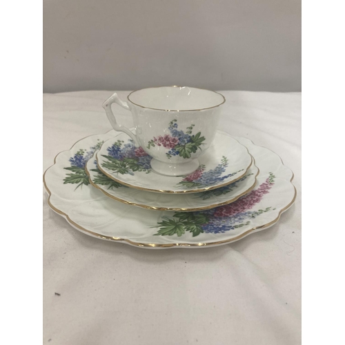 69 - AN AYNSLEY QUAD IN A HYACINTH PATTERN TO INCLUDE CAKE PLATE, CUP, SAUCER AND SIDE PLATE