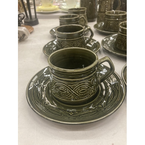 85 - AN ELLGREAVE POTTERY SAXONY DARK GREEN COFFEE SET TO INCLUDE A COFFEE POT, CREAM JUG, SUGAR BOWL, CU... 