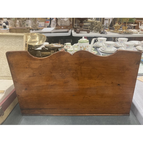 111 - A MAHOGANY LETTER RACK WITH SHAPED TOP HEIGHT 23CM, LENGTH 38.5CM