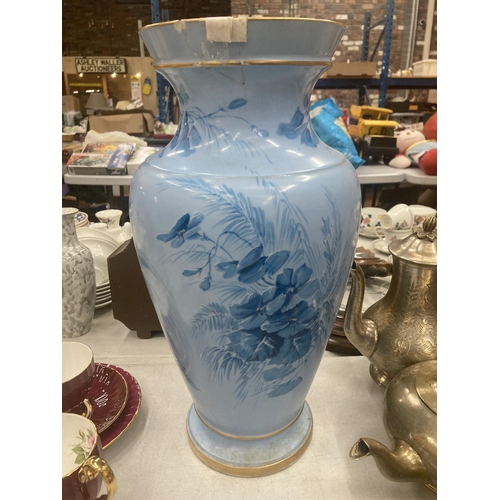 140 - A LARGE VASE IN PALE BLUE WITH A CLASSICAL FIGURE TO THE FRONT, FLOWERS AND GILT TO THE BODY AND RIM... 