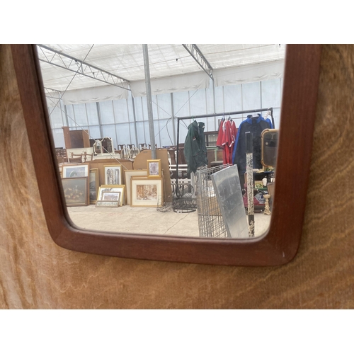 1226 - A TEAK FRAMED WALL MIRROR STAMPED MADE IN DENMARK