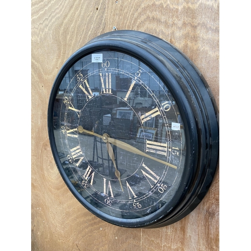 1227 - A LARGE DECORATIVE WALL CLOCK