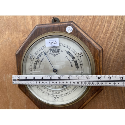 1230 - A VINTAGE OCTAGONAL WOODEN CASED BAROMETER