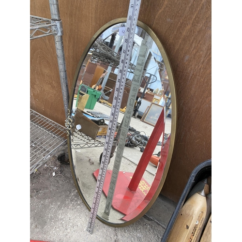 1233 - A BRASS FRAMED BEVELED EDGE WALL MIRROR