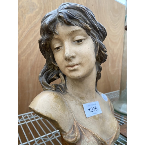 1236 - A RESIN FIGURE OF A FEMALE BUST STAMPED 'LINNOCENCE'