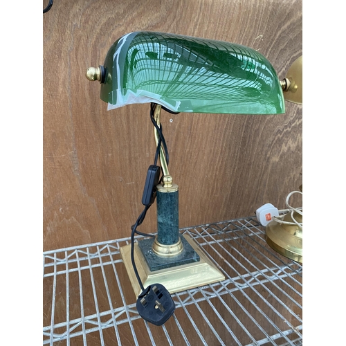 1243 - TWO BANKERS DESK LAMPS TO INCLUDE ONE WITH A GILT SHADE AND ONE WITH A GREEN GLASS SHADE (A/F)