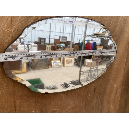 1248 - AN ART DECO BEVELED EDGE WALL MIRROR