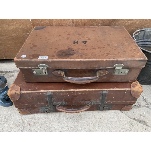 1252 - TWO VINTAGE LEATHER TRAVEL CASES