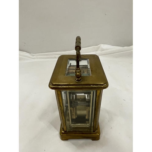 10A - A BRASS CARRIAGE CLOCK BY F A CHANDLER LEMINGTON SPA WITH TOP ESCAPEMENT VEIWING PANE