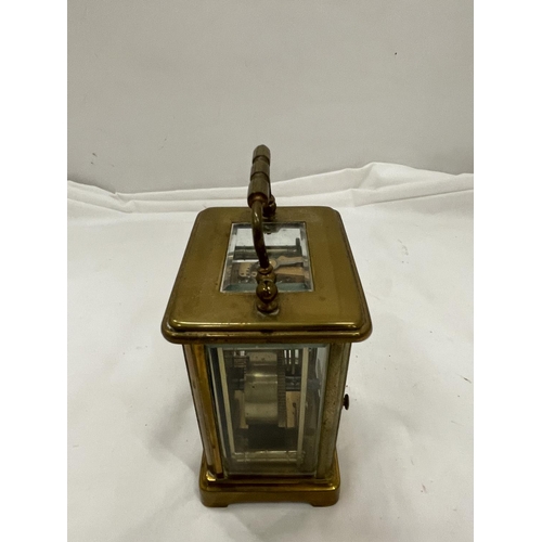 10A - A BRASS CARRIAGE CLOCK BY F A CHANDLER LEMINGTON SPA WITH TOP ESCAPEMENT VEIWING PANE