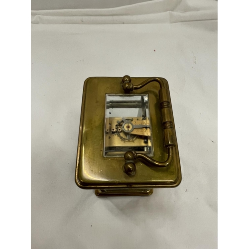 10A - A BRASS CARRIAGE CLOCK BY F A CHANDLER LEMINGTON SPA WITH TOP ESCAPEMENT VEIWING PANE