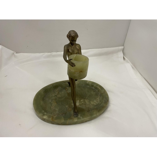 16 - A BRASS LADY WITH AN ONYX TRAY BASE AND TEALIGHT STYLE HOLDER