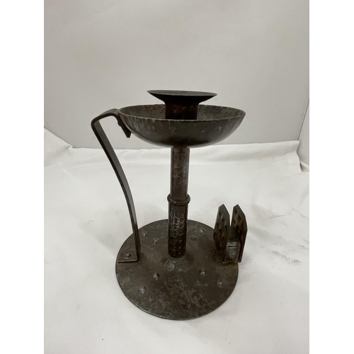 18 - A VINTAGE CANDLESTICK WITH MATCHBOX HOLDER