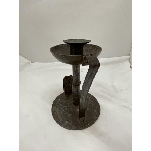 18 - A VINTAGE CANDLESTICK WITH MATCHBOX HOLDER