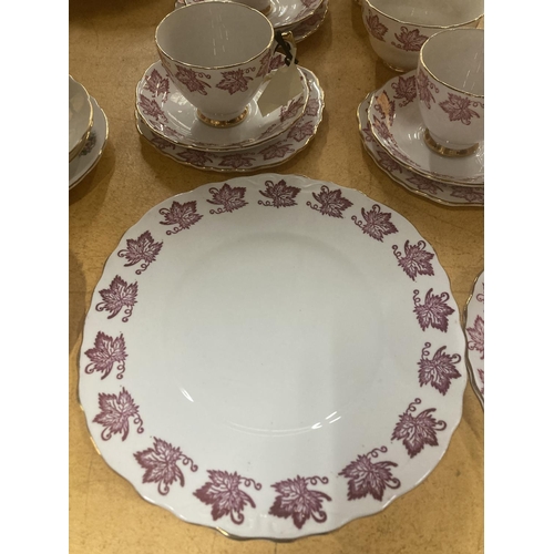 213 - A ROYAL VALE TEASET IN WHITE WITH RED LEAF PATTERN TO INCLUDE A CAKE PLATE, CREAM JUG, SUGAR BOWL, C... 