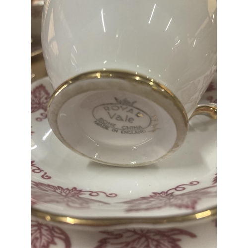 213 - A ROYAL VALE TEASET IN WHITE WITH RED LEAF PATTERN TO INCLUDE A CAKE PLATE, CREAM JUG, SUGAR BOWL, C... 