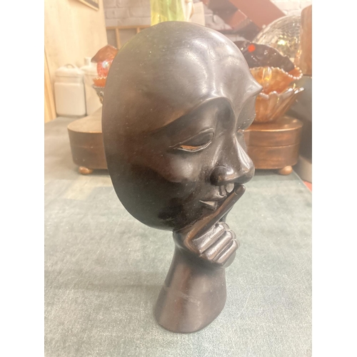 220 - A BLACK SCULPTURED FACE MASK OF A MIME ARTIST