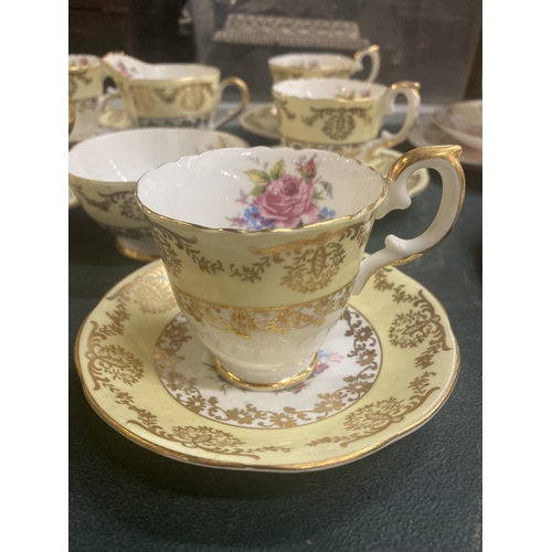 226 - A SPRINGFIELD CHINA TEASET WITH A PALE YELLOW WITH ROSES DESIGN TO INCLUDE SUGAR BOWL, CREAM JUG, CU... 