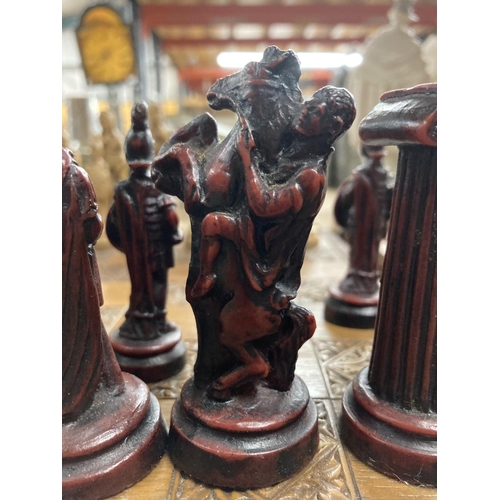 259 - A WOODEN CHESS BOARD WITH RESIN ROMAN FIGURE CHESS PIECES - 3 A/F PLUS A BACKGAMMON/DRAUGTS BOARD WI... 