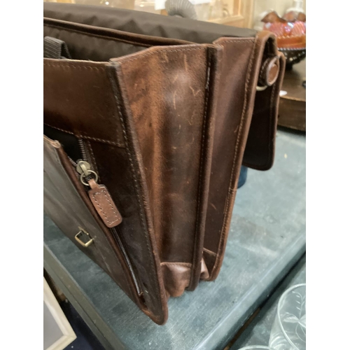 272 - A BROWN WILSON'S LEATHER BRIEF CASE WITH HANDLE